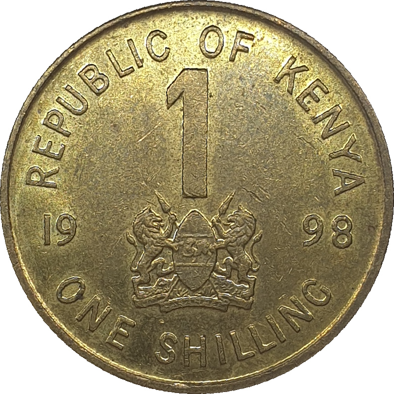 1 shilling - Daniel Toroitich - Small Arms - Brass plated steel